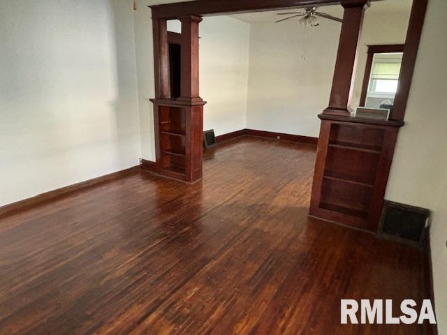712 Roosevelt Ave, Kewanee, IL 61443 - unfurnished room featuring wood finished floors and a ceiling fan