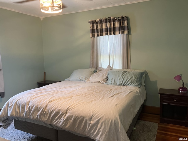 114 S State St, Annawan, IL 61234 - bedroom featuring crown molding and wood finished floors