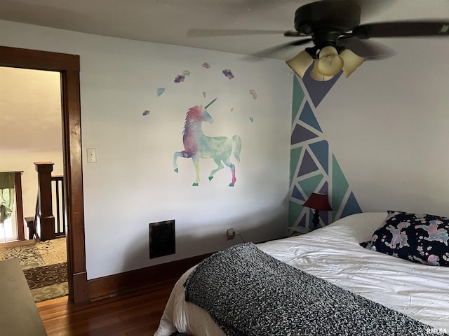 114 S State St, Annawan, IL 61234 - bedroom with wood finished floors and a ceiling fan