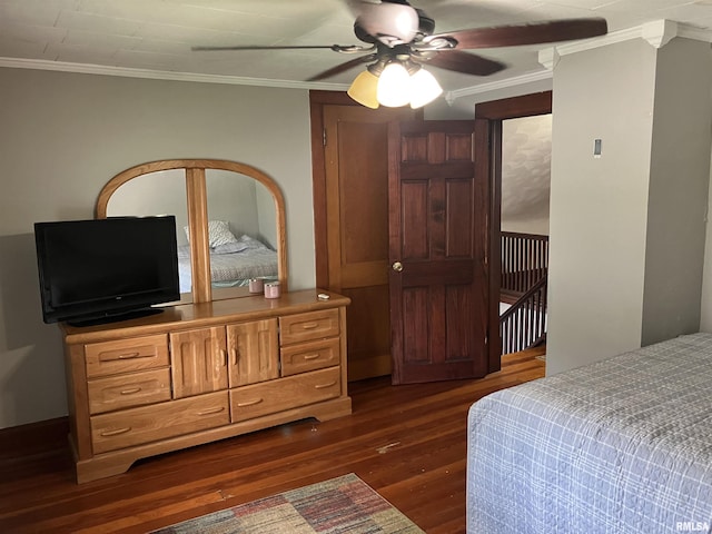 114 S State St, Annawan, IL 61234 - bedroom featuring dark wood-type flooring, ornamental molding, and ceiling fan
