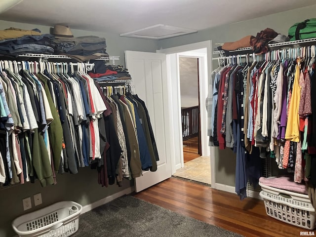 114 S State St, Annawan, IL 61234 - walk in closet featuring attic access and wood finished floors