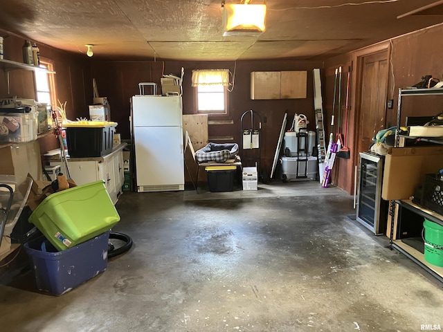114 S State St, Annawan, IL 61234 - garage featuring freestanding refrigerator and a garage door opener