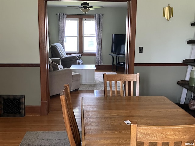 114 S State St, Annawan, IL 61234 - dining space with ceiling fan and wood finished floors