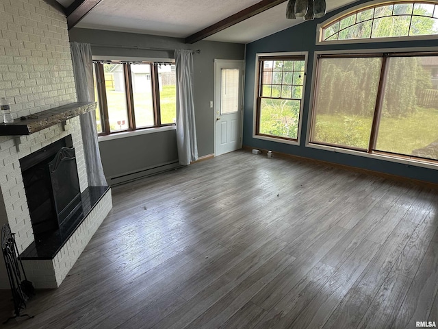 1501 24th Pl, Sterling, IL 61081 - unfurnished living room featuring a fireplace, a baseboard heating unit, and wood finished floors