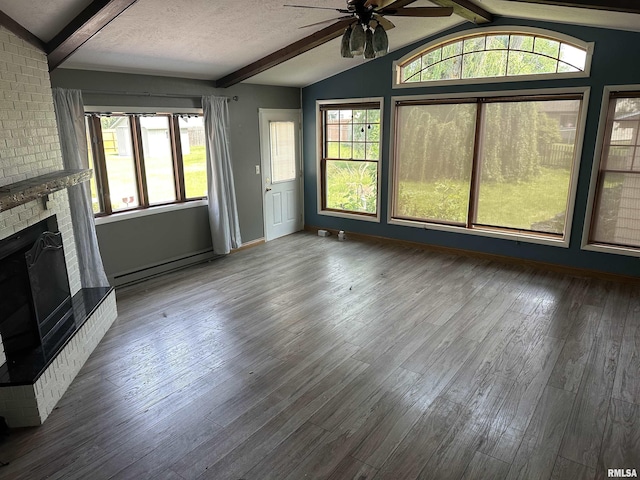 1501 24th Pl, Sterling, IL 61081 - unfurnished living room with a ceiling fan, a fireplace, baseboard heating, and wood finished floors