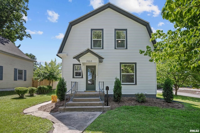2664 Fair Ave, Davenport, IA 52803 - dutch colonial featuring a gambrel roof and a front yard