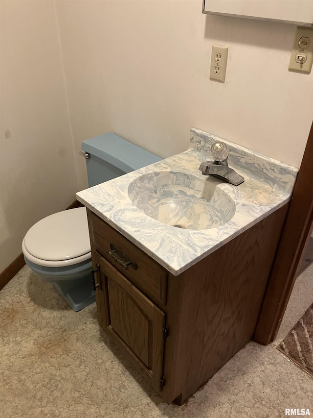 200 S Main St, Annawan, IL 61234 - half bathroom featuring vanity and toilet