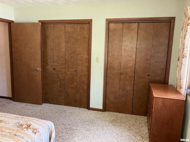 200 S Main St, Annawan, IL 61234 - carpeted bedroom with multiple closets and baseboards