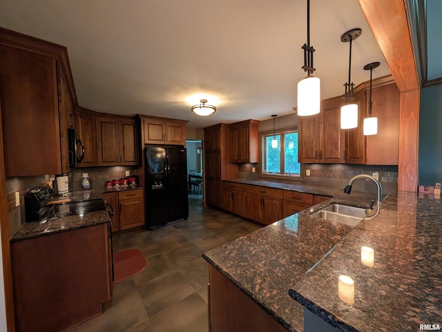 1315 W Wexford Pl, Peoria, IL 61615 - kitchen featuring black fridge with ice dispenser, backsplash, range with electric stovetop, and decorative light fixtures