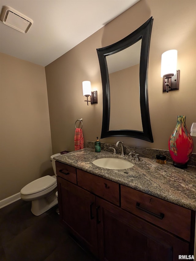 1315 W Wexford Pl, Peoria, IL 61615 - bathroom featuring vanity and toilet