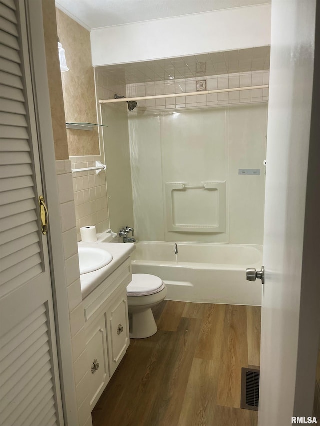 905 W Boulevard St, Marion, IL 62959 - full bathroom featuring vanity, wood finished floors, shower / bath combination, and tile walls