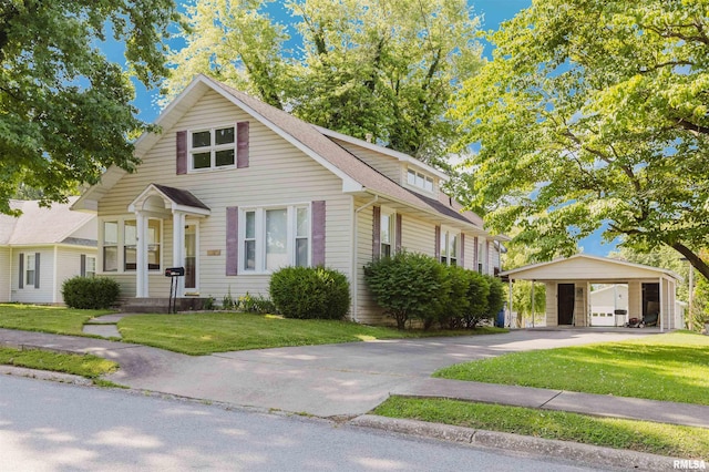 1506 E Oak St, West Frankfort, IL 62896 - view of front facade with a front yard, driveway, and a carport
