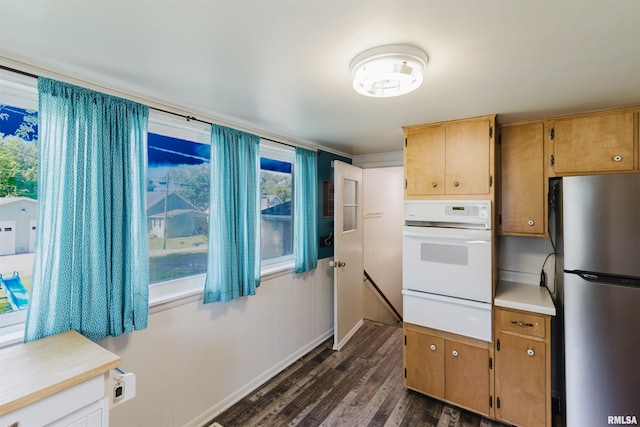 1506 E Oak St, West Frankfort, IL 62896 - kitchen with freestanding refrigerator, white oven, a warming drawer, dark wood-style flooring, and light countertops