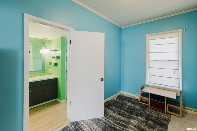 1506 E Oak St, West Frankfort, IL 62896 - unfurnished bedroom with crown molding, lofted ceiling, and connected bathroom
