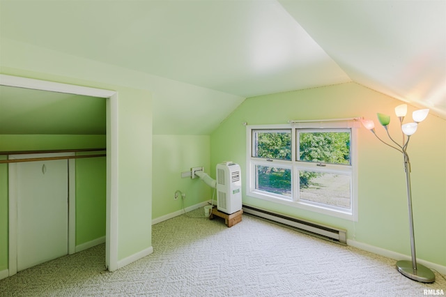 1506 E Oak St, West Frankfort, IL 62896 - additional living space with a baseboard radiator, vaulted ceiling, and carpet floors