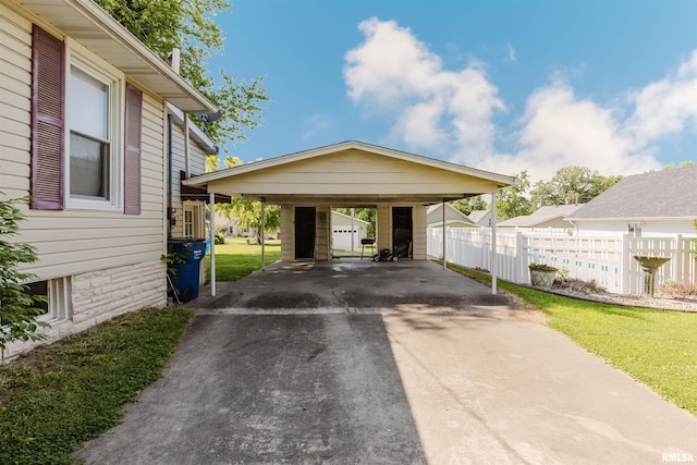 1506 E Oak St, West Frankfort, IL 62896 - view of vehicle parking with asphalt driveway and a carport