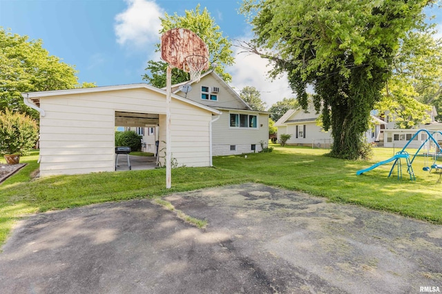 1506 E Oak St, West Frankfort, IL 62896 - rear view of property featuring a yard and a playground