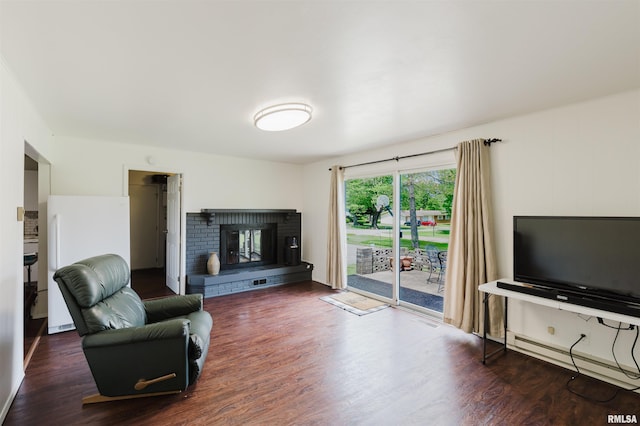 103 Westernaire Dr, Marion, IL 62959 - living room with a brick fireplace and wood finished floors