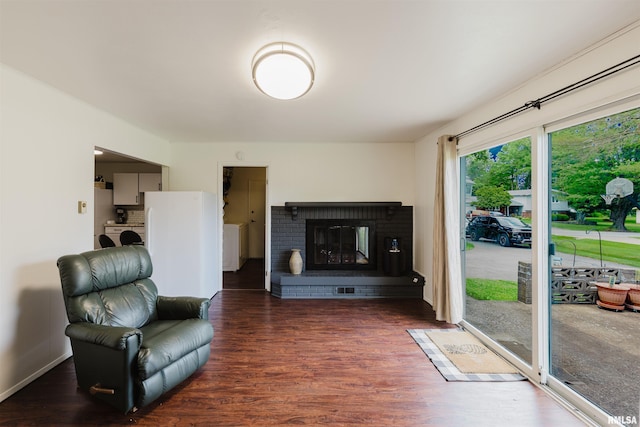 103 Westernaire Dr, Marion, IL 62959 - living area featuring wood finished floors and a fireplace