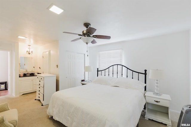 103 Westernaire Dr, Marion, IL 62959 - bedroom featuring light carpet, a chandelier, a closet, and ceiling fan