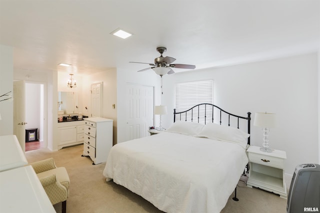 103 Westernaire Dr, Marion, IL 62959 - bedroom featuring light colored carpet, a chandelier, a closet, and ceiling fan