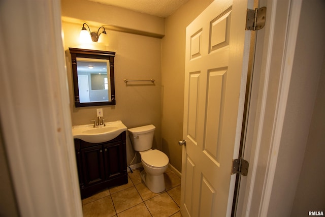 1008 5th Ave, Camanche, IA 52730 - bathroom with tile patterned floors and vanity