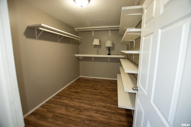1008 5th Ave, Camanche, IA 52730 - spacious closet with dark wood-type flooring