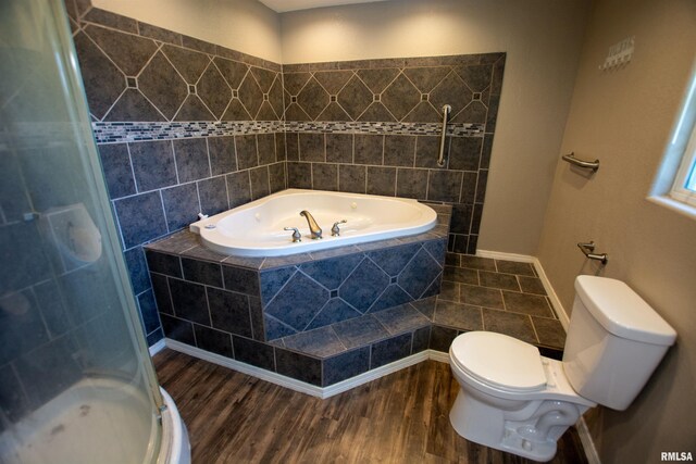 1008 5th Ave, Camanche, IA 52730 - full bath with a bath, wood finished floors, and a stall shower