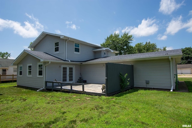 1008 5th Ave, Camanche, IA 52730 - back of house with french doors, a wooden deck, and a yard