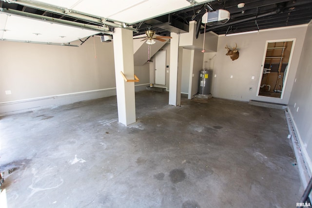 1008 5th Ave, Camanche, IA 52730 - garage with a garage door opener and water heater