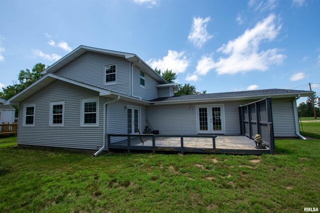 1008 5th Ave, Camanche, IA 52730 - rear view of property featuring french doors, a deck, and a lawn