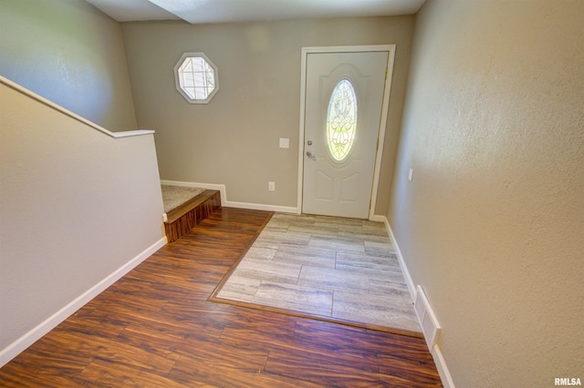 1008 5th Ave, Camanche, IA 52730 - entrance foyer featuring wood finished floors and baseboards