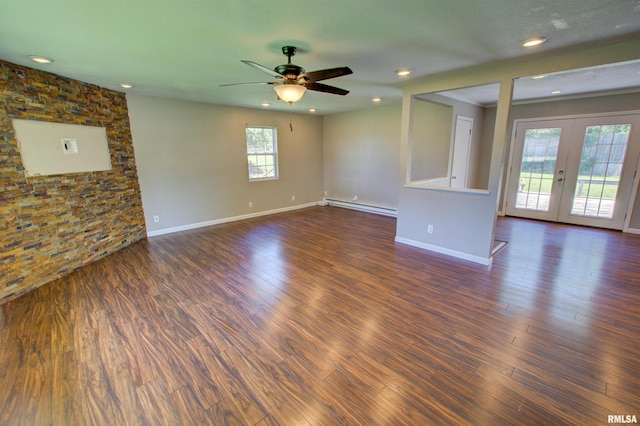 1008 5th Ave, Camanche, IA 52730 - unfurnished living room with baseboard heating, french doors, ceiling fan, dark wood-style flooring, and recessed lighting