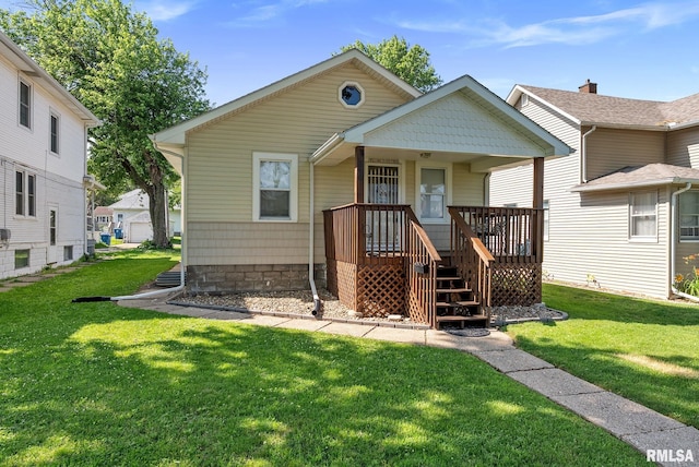 240 15th Ave, East Moline, IL 61244 - bungalow featuring a front lawn and a porch