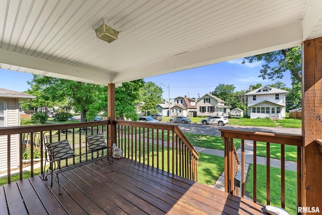 240 15th Ave, East Moline, IL 61244 - wooden deck with a residential view and a lawn
