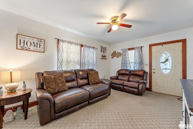 240 15th Ave, East Moline, IL 61244 - living area featuring ceiling fan and light carpet