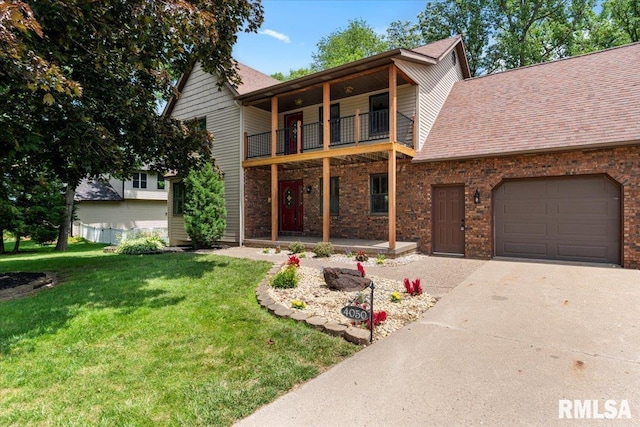 4050 4th St Unit B, East Moline, IL 61244 - traditional-style house featuring a balcony, a garage, a front lawn, driveway, and a shingled roof