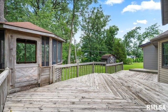 4050 4th St Unit B, East Moline, IL 61244 - deck with a storage unit and a yard
