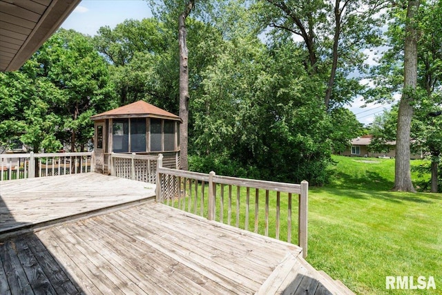 4050 4th St Unit B, East Moline, IL 61244 - deck with a gazebo, a yard, a sunroom, and view of scattered trees