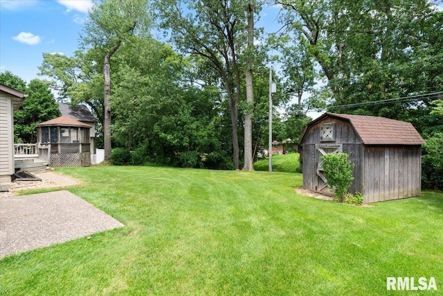 4050 4th St Unit B, East Moline, IL 61244 - view of grassy yard with a gazebo, a storage shed, and a deck