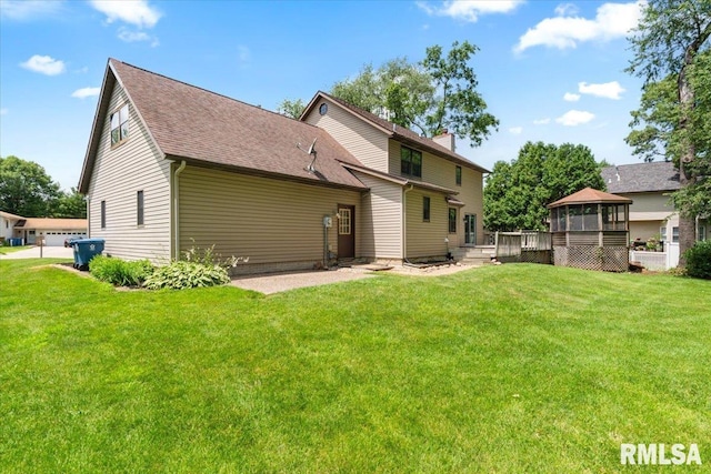 4050 4th St Unit B, East Moline, IL 61244 - back of house with a gazebo, a yard, a deck, and a shingled roof