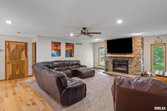 910 Fyre Lake Dr, Sherrard, IL 61281 - living area featuring a fireplace, light wood-style floors, ceiling fan, and recessed lighting