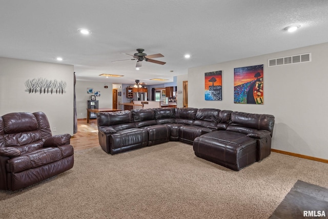 910 Fyre Lake Dr, Sherrard, IL 61281 - living room with light carpet, recessed lighting, and a ceiling fan