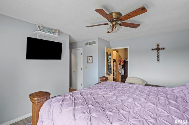 910 Fyre Lake Dr, Sherrard, IL 61281 - bedroom with wood finished floors and a ceiling fan