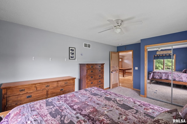 910 Fyre Lake Dr, Sherrard, IL 61281 - carpeted bedroom with ceiling fan and a closet