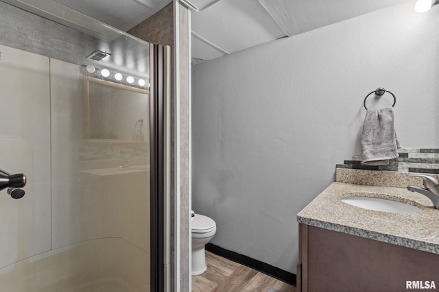 910 Fyre Lake Dr, Sherrard, IL 61281 - bathroom with wood finished floors, vanity, and a stall shower