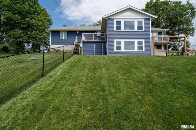 910 Fyre Lake Dr, Sherrard, IL 61281 - rear view of property featuring a fenced backyard, stairs, and a wooden deck