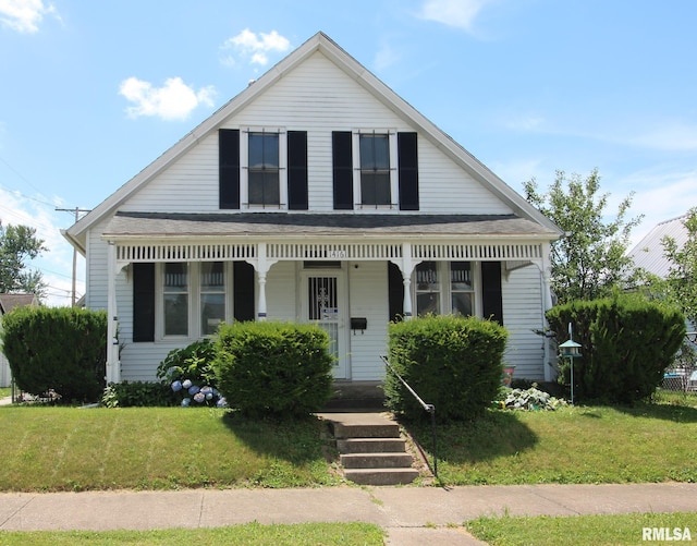 1416 Payson Ave, Quincy, IL 62301 - view of front of home with covered porch and a front lawn