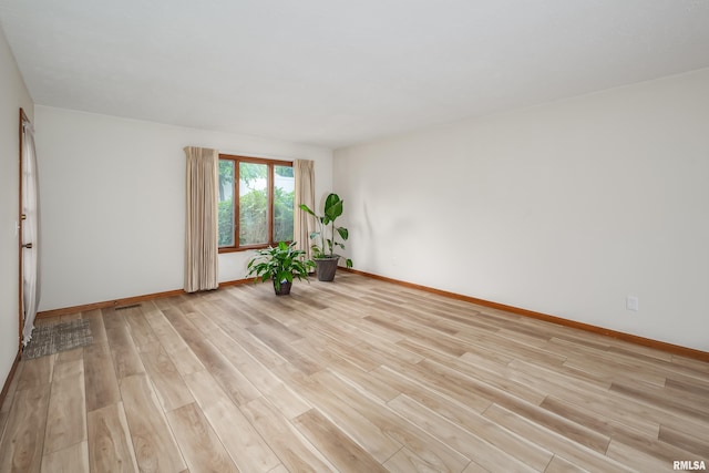 4554 Bunker Hill Dr, Bettendorf, IA 52722 - spare room featuring light wood-style floors