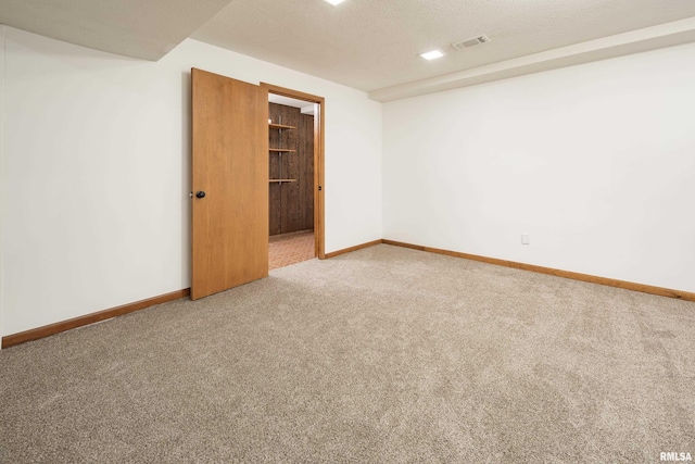 4554 Bunker Hill Dr, Bettendorf, IA 52722 - spare room featuring carpet floors